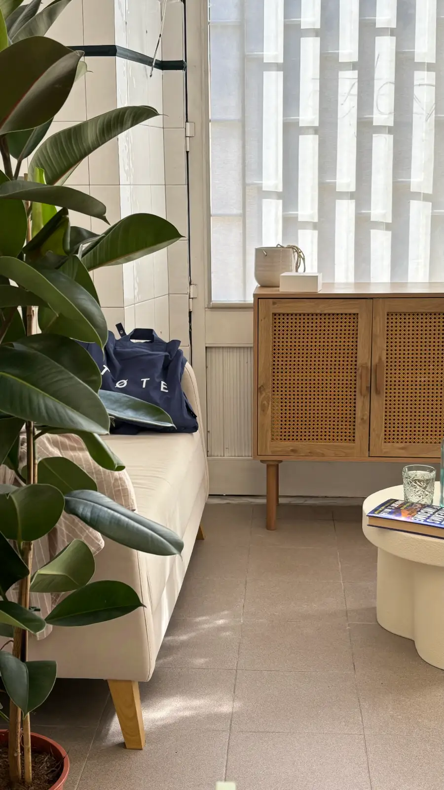 rattan cabinet in an entryway