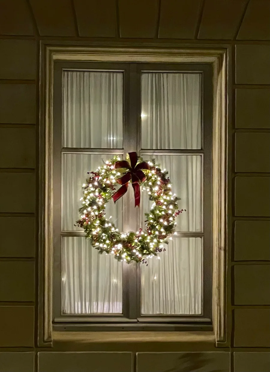 greenery wreath on a glass door
