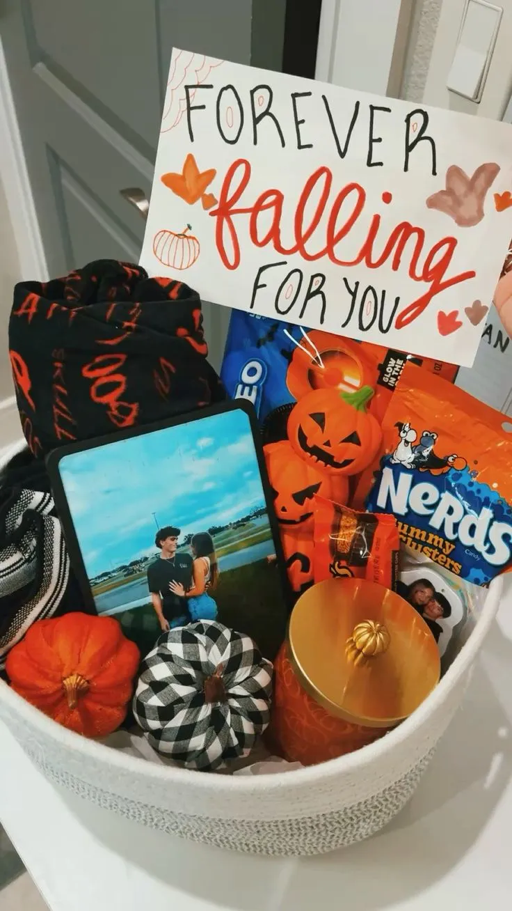 Halloween gift basket ideas for boyfriend with snacks, candy and a framed photo