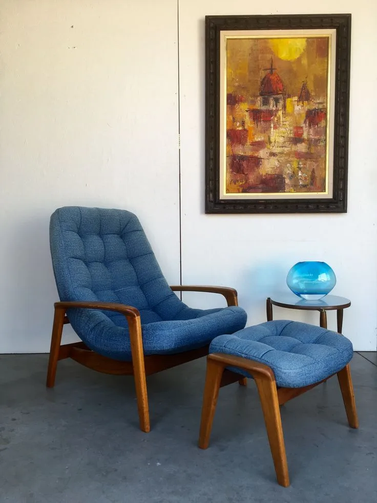 Blue tufted mid century lounge chair with ottoman