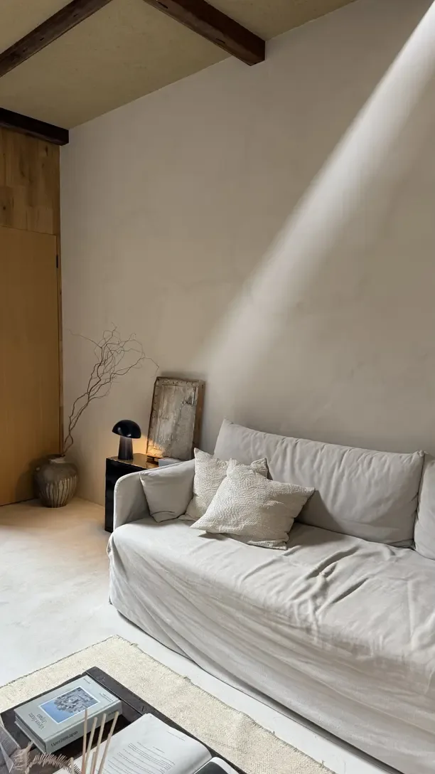 neutral living room ideas with a linen sofa in a sunbeam